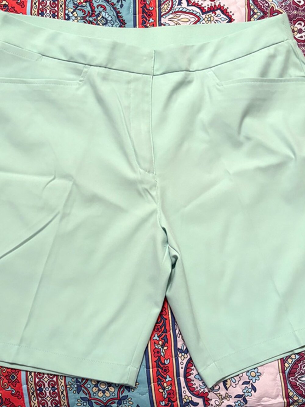 Women's Puma X-large mint green golf shorts.